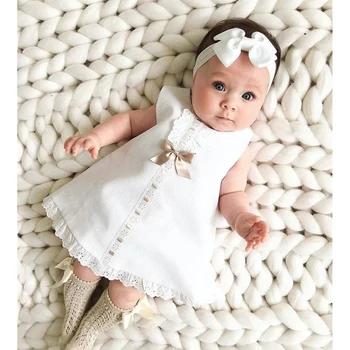 2023 התינוק קיץ בגדי התינוק הנולד ילדה שמלת תחרה ללא שרוולים Bowknot צלע לבן מוצק משמרת השמלה בגימור